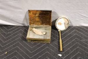 lot 474 image: Antique Tobacco Tin with Stone Piece and Decorative Hand Mirror