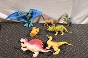 lot 477 image: Set of 8 Dinosaur Toys with Diverse Species