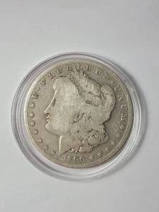 lot 8 image: 1890-O Morgan Silver Dollar 