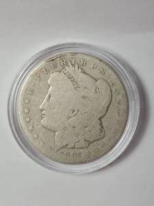 lot 10 image: 1891-O Morgan Silver Dollar  