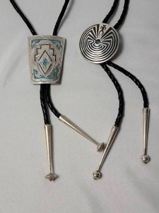 lot 94 image: 2 Leather Bolo Sterling Silver one with Turquoise Embellishment and one unique design