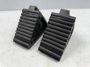 lot 141 image: Extreme Max Heavy-Duty Solid Rubber Wheel Chock with Handle - 2pk