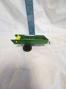 lot 33 image: ERTL John Deere Manure Spreader, appears new, no box