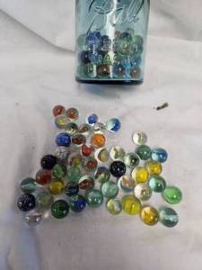 lot 41 image: Green Ball Jar of Marbles