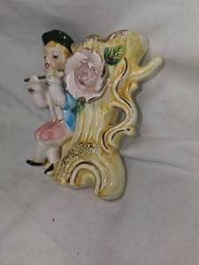lot 50 image: Vintage Little Boy Flute Player Vase