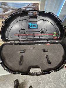 lot 93 image: Bow Hard Case with a couple of arrows