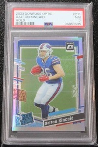 lot 22 image: 2023 Donruss Optic Prizm Holo Dalton Kincaid #211 PSA 7 Rookie Card