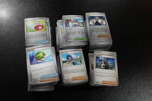 lot 149 image: Pokemon Scarlet & Violet Trainers Only Lot  550 Non Holo & 475 Reverse Holo