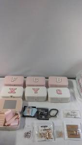 lot 15 image: 7 Travel Box Jewelry Organizers and an Assortment of Jewelry