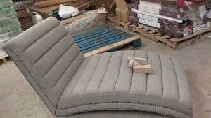 lot 112 image: Gray Upholstered Loveseat with Nailhead Trim and Wooden Legs