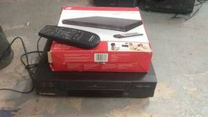 lot 124 image: Used Emerson DVDVCR Combo with Remote Control