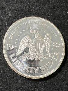 lot 36 image: 1 TROY OZ .999 FINE SILVER 1987 LIBERTY ROUND