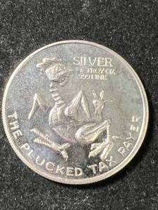 lot 73 image: 1 TROY OZ .999 FINE SILVER PLUCKED TAX PAYER ROUND
