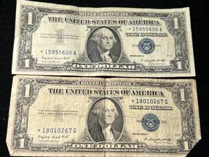 lot 93 image: 2 US BLUE SEAL $1 SILVER CERTIFICATE STAR NOTES