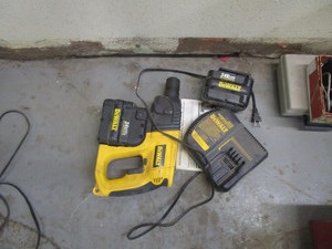 lot 52 image: DeWalt 24v Hammer Drill, Batteries, Charger