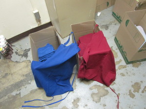 lot 65 image: (2) Boxes of Aprons