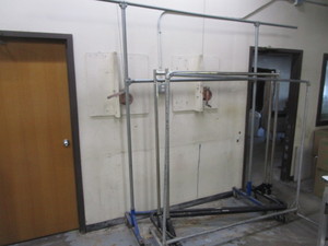 lot 82 image: Rolling Hanger Racks