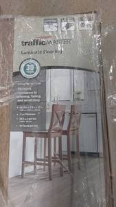 lot 16 image: 320.84 Square Feet of TrafficMASTER Sweetwater Oak Laminate Flooring - 13 Boxes