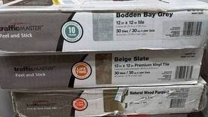 lot 33 image: Lot of TrafficMASTER Peel and Stick Vinyl Tiles in Various Colors