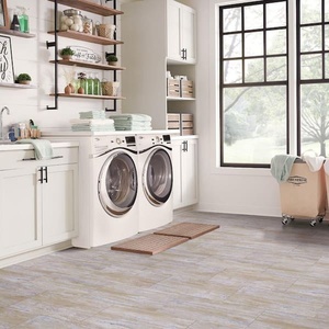 lot 40 image: Golden Travertine Vinyl Peel and Stick Floor Tiles - 2 Boxes of 15, 12x24 Inch