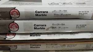 lot 41 image: Lot of 4 Boxes of Carrara Marble Peel and Stick Tiles 12x24 inches