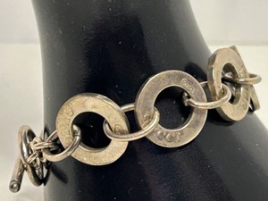 lot 10 image: Vintage Gucci 925 Silver Stamped Disk Bracelet - 8 Inch