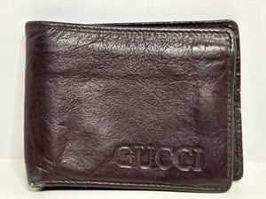 lot 122 image: GUCCI Dark Brown Leather Mens Bifold Wallet