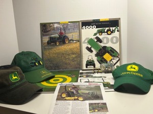 lot 138 image: Collection of JOHN DEERE Hats and Vintage Brochures
