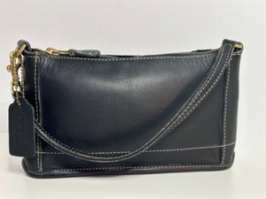 lot 144 image: COACH Black Leather Handbag with Brass Accents & White Stitching