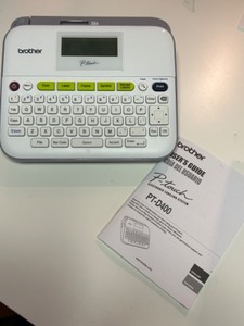 lot 157 image: Brother PT-D400 Electronic Labeling System with Users Guide