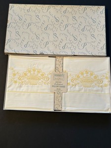 lot 172 image: 1950s NOS Penneys Fashion Manor Ecru Pillow Cases with Yellow Embroidery New in Box