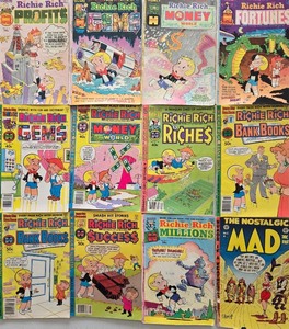 lot 58 image: Collection of 12 Vintage RICHIE RICH and MAD Comics