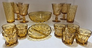 lot 103 image: Vintage Amber Glassware Set with Goblets, Tumblers, and Bowls