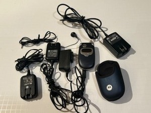 lot 268 image: Vintage MOTOROLA T-Mobile Flip Phone with Chargers and Accessories Bundle