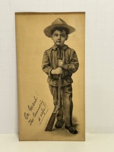 lot 319 image: Vintage Sepia Photograph Print of Boy with Rifle WWI Promo Ad