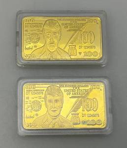 lot 204 image: DONALD TRUMP Collectible Gold Electroplated Bullion Hundred Dollar Art Bar In Protective Case