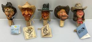 lot 248 image: 1990s Collectible Chris Hammack  Spit N Whittle Miniature  Resin Cowboy Head Bottle Stoppers