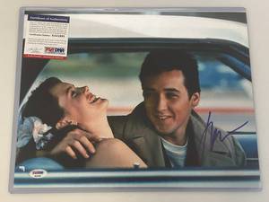 lot 28 image: PSADNA Certified (John Cusack) Autographed  Photograph 11 X 14 (With COA) In Protective Hard Sleeve