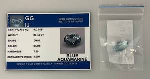 lot 294 image: GG IJ Gems Gemological Institute Of Jaipuur 17.45 Ct Oval Blue Aquamarine With ID Card