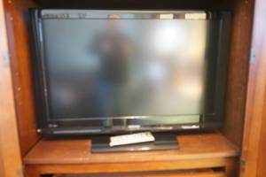lot 2 image: Toshiba TV with remote