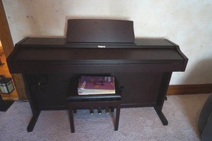 lot 27 image: Roland Digital Piano