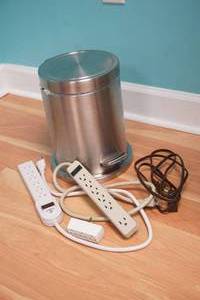 lot 130 image: small trash can and power strips