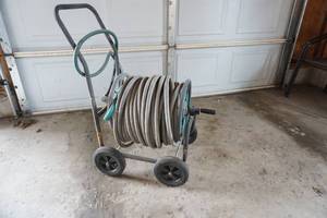 lot 151 image: hose & reel length unknown