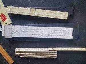 lot 5 image: Various Vintage measuring devices, Slide Rule, Metal Rulers and More With Red Owl Coast to Coast Advertising and others