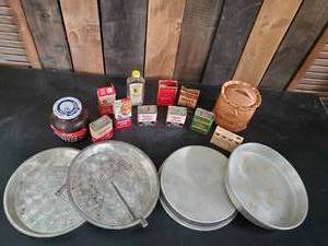 lot 23 image: Vintage Kitchen Lot Ovenex Pie Pans, Amber Glass Baked Bean Jar, Misc Spice Tins and more