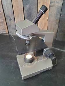 lot 34 image: Olympus Lighted Microscope Seems to work as it should