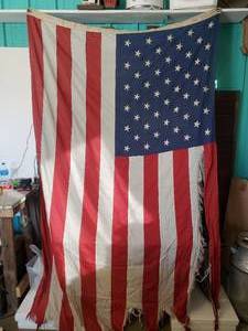 lot 51 image: Vintage 50 Star American Flag Its been Whipped in the wind but So still so Cool