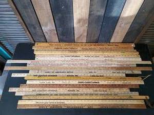 lot 67 image: Cool Vintage Lot of Wooden Yardsticks some with Advertising Great for Crafts or display
