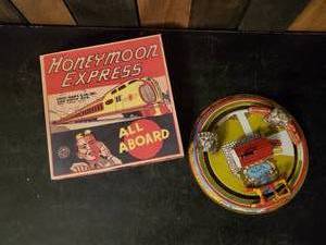 lot 96 image: CHECK THIS OUT  Vintage Louis Marx &ampm Co. Inc. Honeymoon Express ALL Aboard Metal Toy Train, winds but needs to be tweaked.