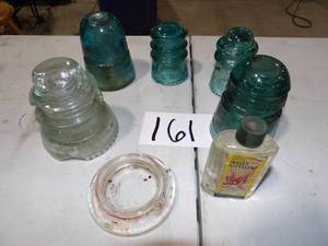 5 GLASS INSULATORS, 2 HAVE BIG CHIPS, 1 HAS SML CHIP, 2 ARE JUST SCRATCHED UP, 1 VINTAGE INSECT REPELLANT JAR FULL